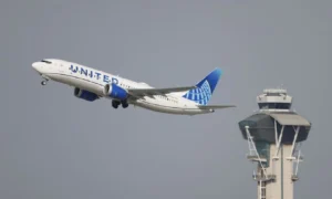 FAA and United Probe Cockpit Visitor on Baseball Teams Flight